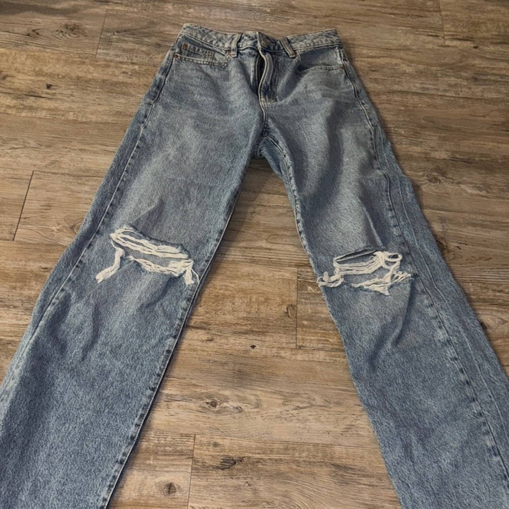 Women’s High Rise Distressed Blue Jeans